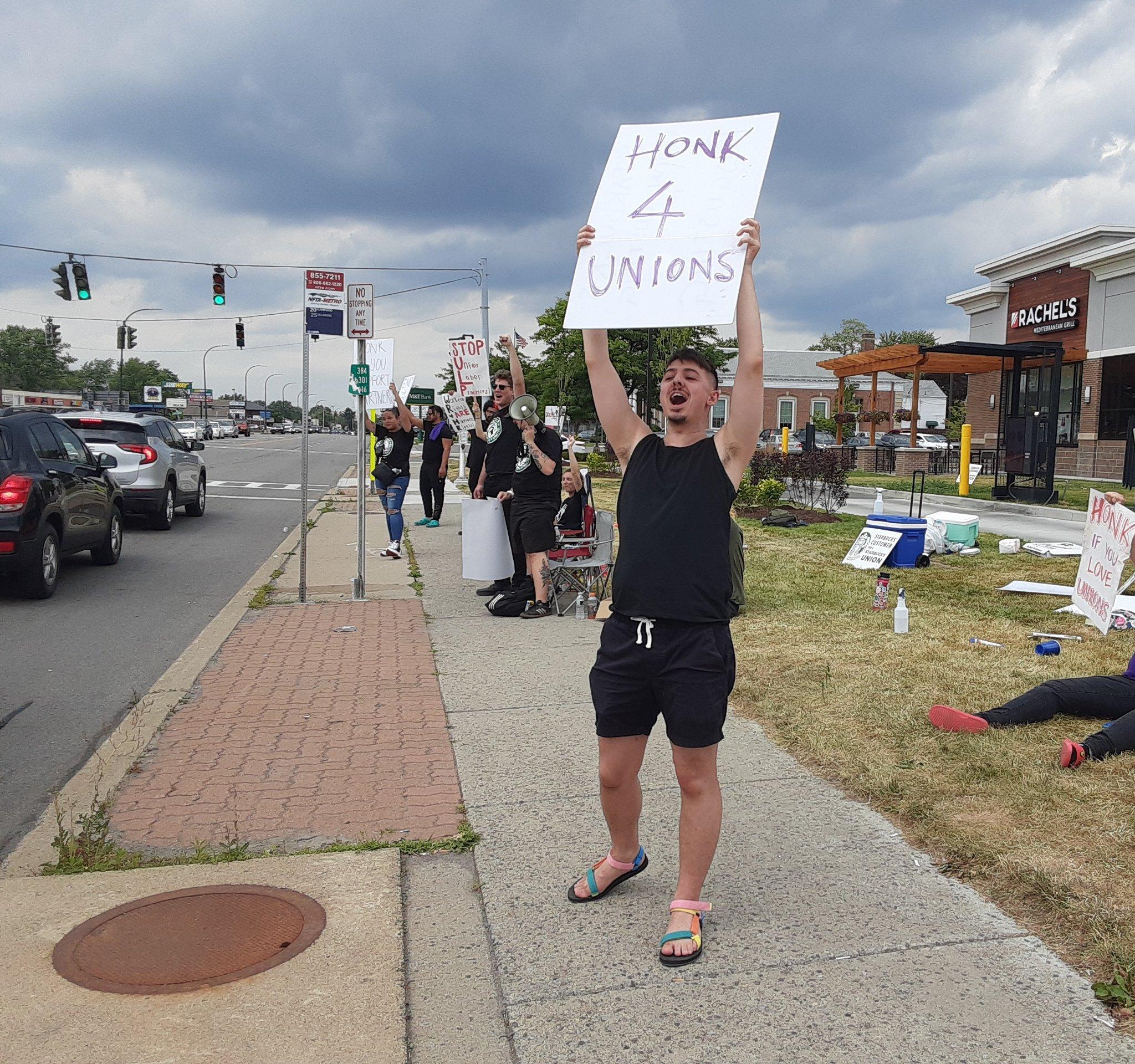 Sam on the picket line. Despite being fired, he still fights.